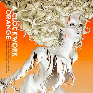 May include: A black and white illustration of a woman with long blonde hair, wearing a chain around her wrist. The woman is covered in white paint that is dripping down her body. The background is a bright orange colour. The text "A CLOCKWORK ORANGE" is written in black letters on the left side of the image.