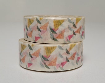May include: Two rolls of washi tape with a geometric pattern of pink, yellow, and green triangles and leaves on a white background.