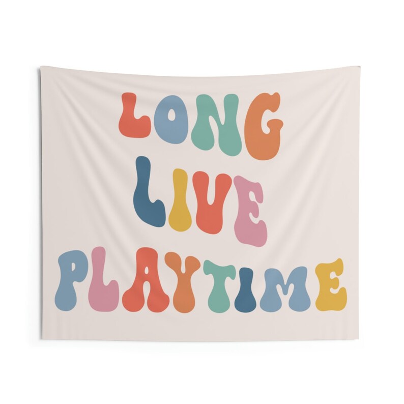 May include: A tapestry featuring the text "Long Live Playtime" in colourful, retro-style lettering.