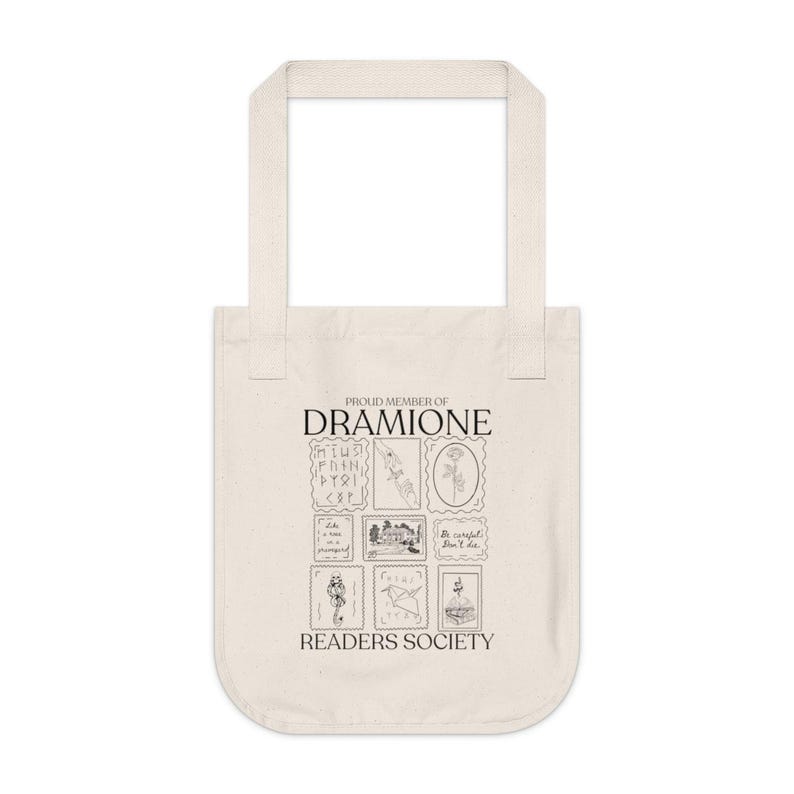 May include: A white canvas tote bag with a black graphic design. The design features the text "Proud Member of Dramione Readers Society" and a series of nine black and white illustrations.