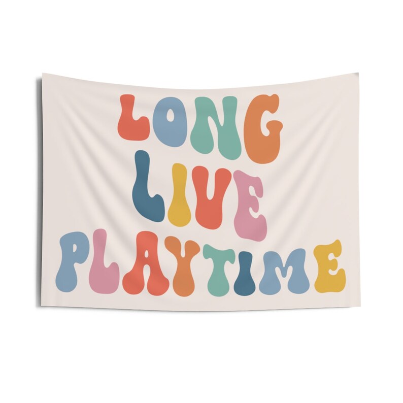 May include: A tapestry featuring the text "Long Live Playtime" in colourful, wavy letters. The letters are in shades of blue, green, yellow, orange, pink, and red.