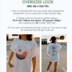 May include: Two white t-shirts with different graphic designs. The first shirt has a graphic of a sunset over mountains with the text "Death Valley Explore the Southeastern California". The second shirt has a graphic of a palm tree with the text "Stay close to people who feel like sunshine Let the good times shine in".