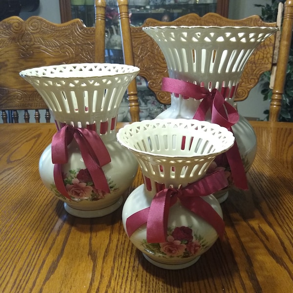 Formalities Vases by Baum Bros.  3 different sizes.  Pristine condition,