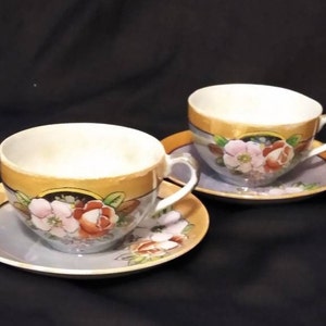 Hand Painted cup and saucer set, made in Japan.