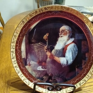 Normal Rockwell Christmas Memories Series.  2000 and 2001 plates