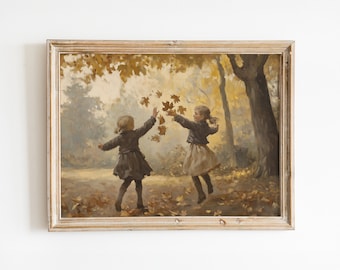 May include: A framed painting depicting two girls in dresses playing in a forest setting. The girls are throwing autumn leaves in the air. The painting is set against a backdrop of trees and foliage in shades of brown, green, and yellow.