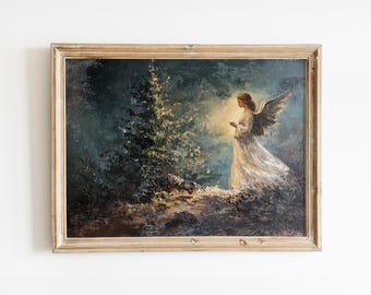 May include: A framed painting of an angel with wings standing in a forest setting. The angel is wearing a white gown and has long brown hair. The forest is dark and mysterious, with a large tree in the background.