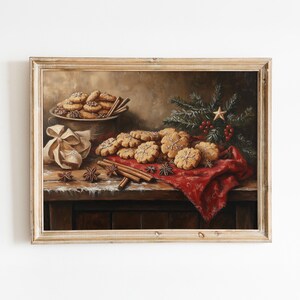 May include: A framed painting of a still life featuring a bowl of cookies, cinnamon sticks, star anise, and a red cloth. The cookies are arranged in a circle and have a snowflake design. The painting has a rustic, vintage feel.