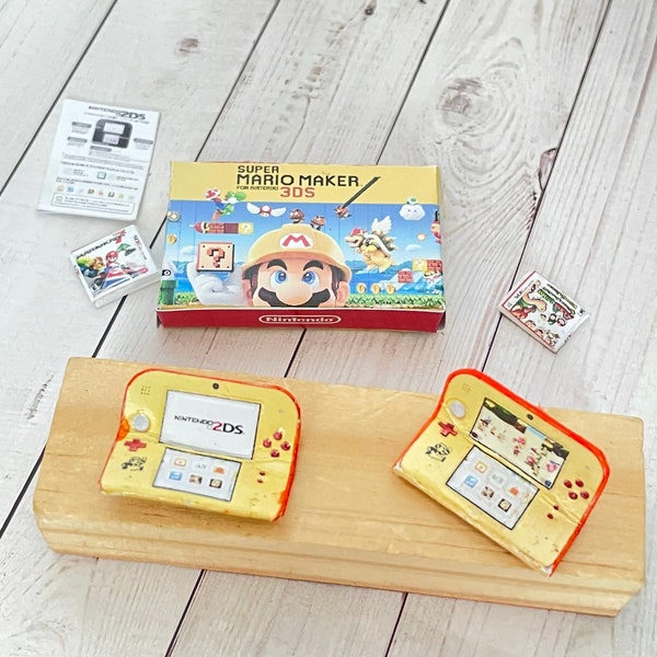 Miniature Nintendo 2Ds handheld game