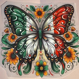 May include: A colorful butterfly design with green, white, and red wings, resembling a flag. The butterfly is surrounded by orange sunflowers and green leaves. The artwork has a detailed, decorative style.