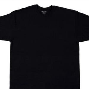 May include: A plain black crew neck t-shirt. The shirt has short sleeves and a classic, relaxed fit. The Gildan brand logo is visible on the neckline. This versatile tee is suitable for casual wear or layering.