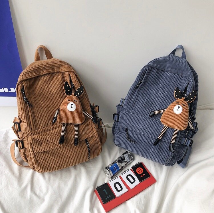 black corduroy backpack