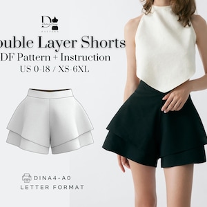 Puede incluir: Un patrón de costura digital para pantalones cortos de doble capa con el texto Double Layer Shorts PDF Pattern + Instruction US 0-18 / XS-6XL y DINA4-A0 LETTER FORMAT. La imagen muestra un dibujo técnico y unos pantalones cortos negros.