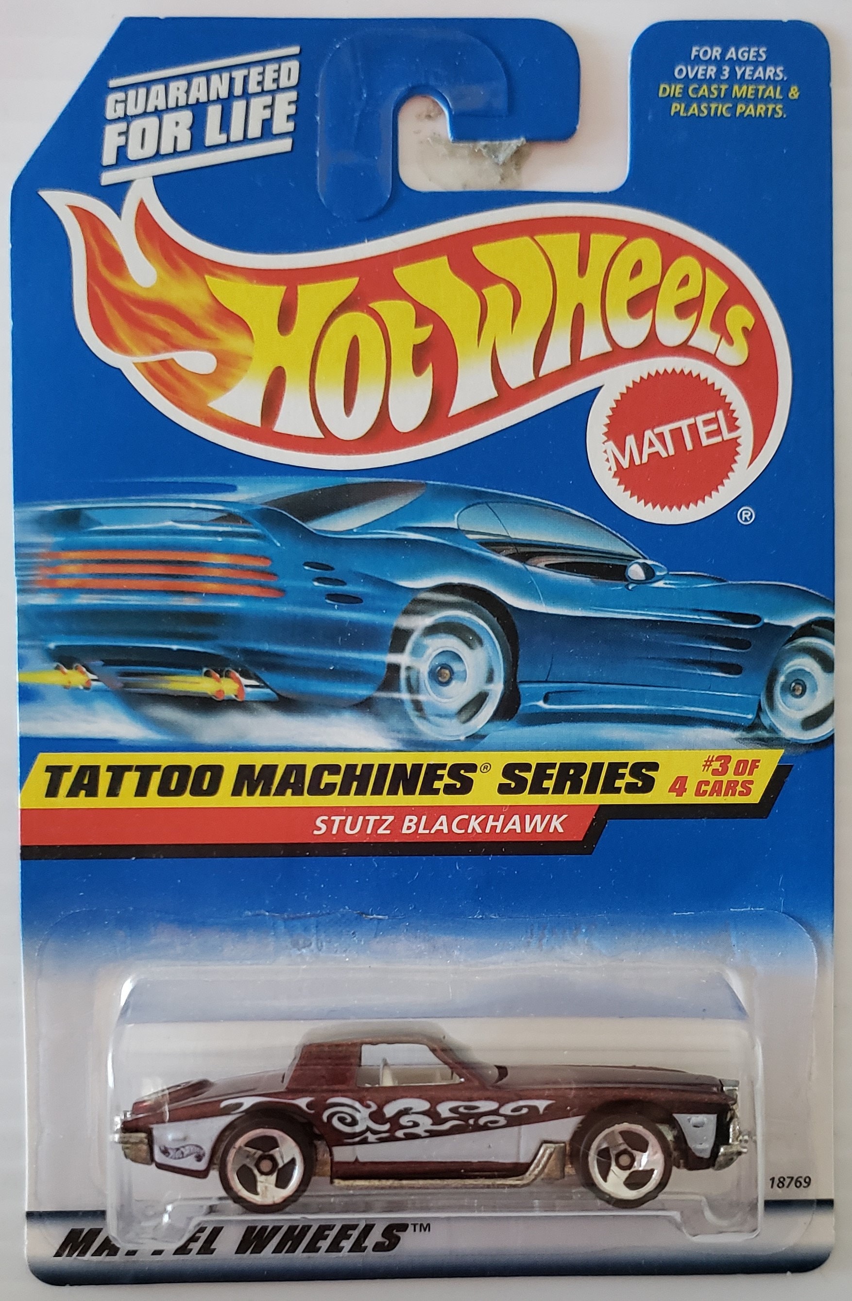 1998 Hot Wheels #687 Tattoo Machine Series #3 Stutz Blackhawk blue car card 