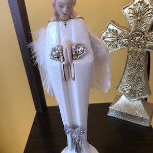 Vintage Angel Madonna in prayer