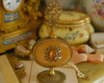 Frasco de perfume Art Déco vintage con tapón de ámbar para decoración de tocador.
