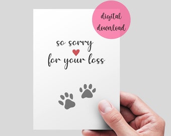 Puede incluir: Tarjeta de condolencias imprimible con el texto "so sorry for your loss" y dos huellas de patas. La tarjeta tiene un corazón rojo y es una descarga digital.