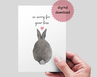 May include: A digital download of a sympathy card featuring a watercolor illustration of a gray rabbit's backside with a pink heart above it. The text "so sorry for your loss" is written in black cursive.