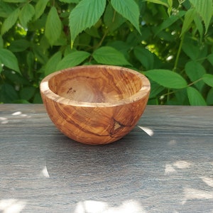 Sustainably handcrafted natural olive wood bowls, handmade olive wood bowls, different variations