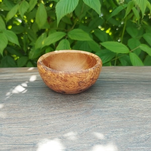Sustainably handcrafted natural olive wood bowls, handmade olive wood bowls, different variations