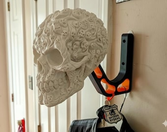 Tormented Souls Skull Motorcycle Helmet Holder: Dual-Tone Wall Mount, Edgy Biker Garage Decor