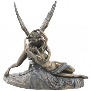 May include: A bronze sculpture of a classical scene. One figure, with large wings, is positioned over another reclining figure. The sculpture, with detailed features, is set on a rocky base. The figures are in a bronze colour.