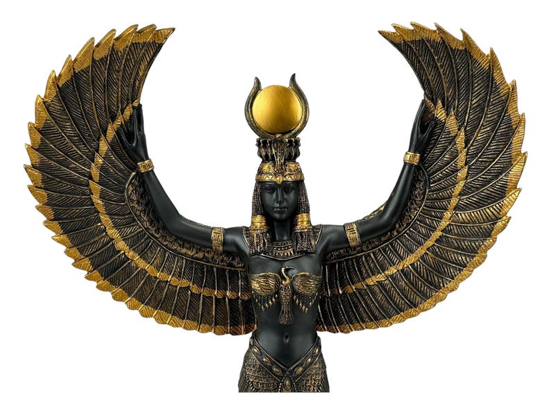 May include: Black and gold statue of the Egyptian goddess Isis with outstretched wings. She wears a crown with a sun disc and holds her arms up in a gesture of protection.