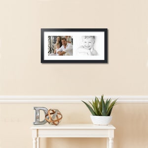May include: A black picture frame with two photos. The photo on the left shows a family of three, a man, a woman, and a child. The photo on the right shows a close-up of a child smiling.