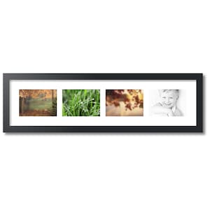 May include: A black picture frame with four openings, each displaying a different image. The images are of a forest scene, a close-up of grass with dew drops, a blurry sunset, and a black and white portrait of a smiling child.