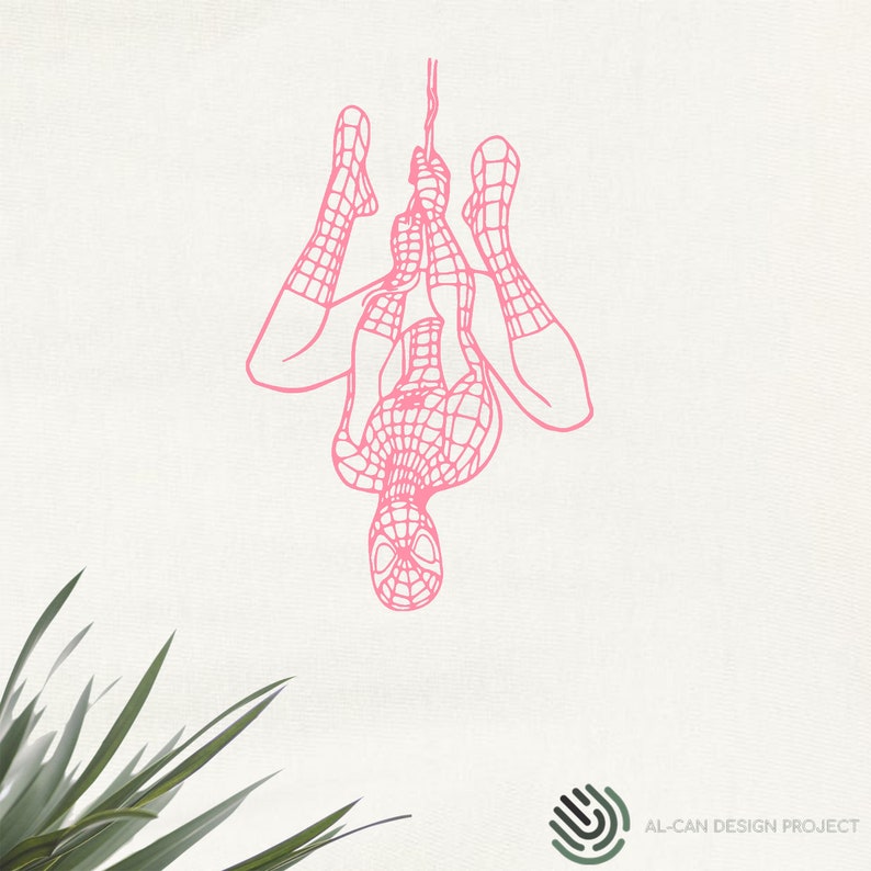 May include: Pink line art of Spider-Man hanging upside down from a web. The superhero is depicted in a classic pose, with his arms and legs outstretched. The image is set against a white background, with green leaves in the lower left corner.