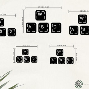 May include: Five different sizes of black and white keyboard stickers with the letters W, A, S, and D. The stickers are shown with measurements in inches and centimetres.