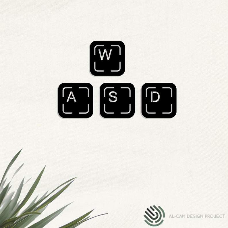 May include: Black and white keyboard keys with the letters W, A, S, and D printed on them. The keys are arranged in a diamond shape.
