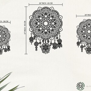 May include: Three black and white mandala dreamcatchers with intricate designs and beaded fringe. The largest dreamcatcher is 65 cm in diameter, the middle dreamcatcher is 38 cm in diameter, and the smallest dreamcatcher is 51 cm in diameter.