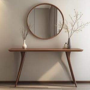 May include: A contemporary interior scene with a wooden console table and a circular mirror. The table has a streamlined design with curved legs. Vases with branches and small bottles are placed on the table, adding a touch of elegance to the room.