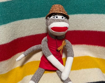 Traditional Salish style cedar hat on a Sock Monkey