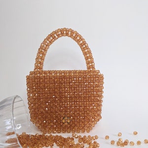 Pin by Emilia on Things I love  Sparkly purse, Beaded bags, Rhinestone  projects