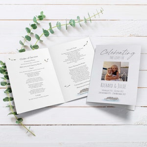 May include: A white and grey memorial service booklet with a photo of a couple on a boat. The booklet includes an order of service, hymns, and a poem. The text reads "Celebrating the Lives of Richard & Julie".