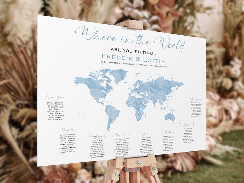 May include: A blue watercolor world map wedding seating chart with the text "Where in the World Are You Sitting... Freddie & Lottie" and the venue and date. The names of guests are listed under different cities around the world.