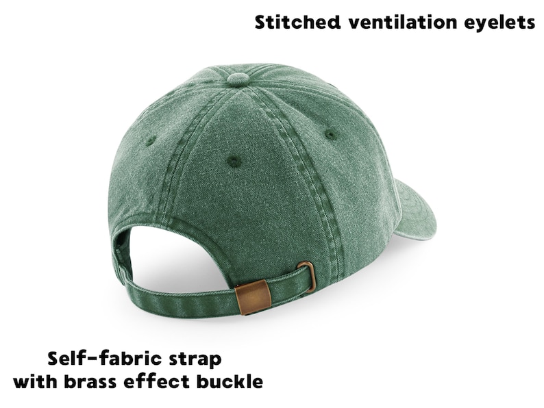 May include: A green baseball cap with stitched ventilation eyelets and a self-fabric strap with a brass effect buckle. The cap has a curved brim and a button on top. The text "Stitched ventilation eyelets" and "Self-fabric strap with brass effect buckle" are visible.