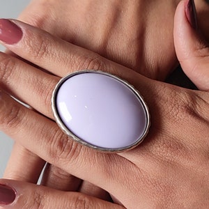 Large oval handmade Lilac statement ring in adjustable silver setting. Women&#39;s large Purple violet stone in open expandable ring setting.
