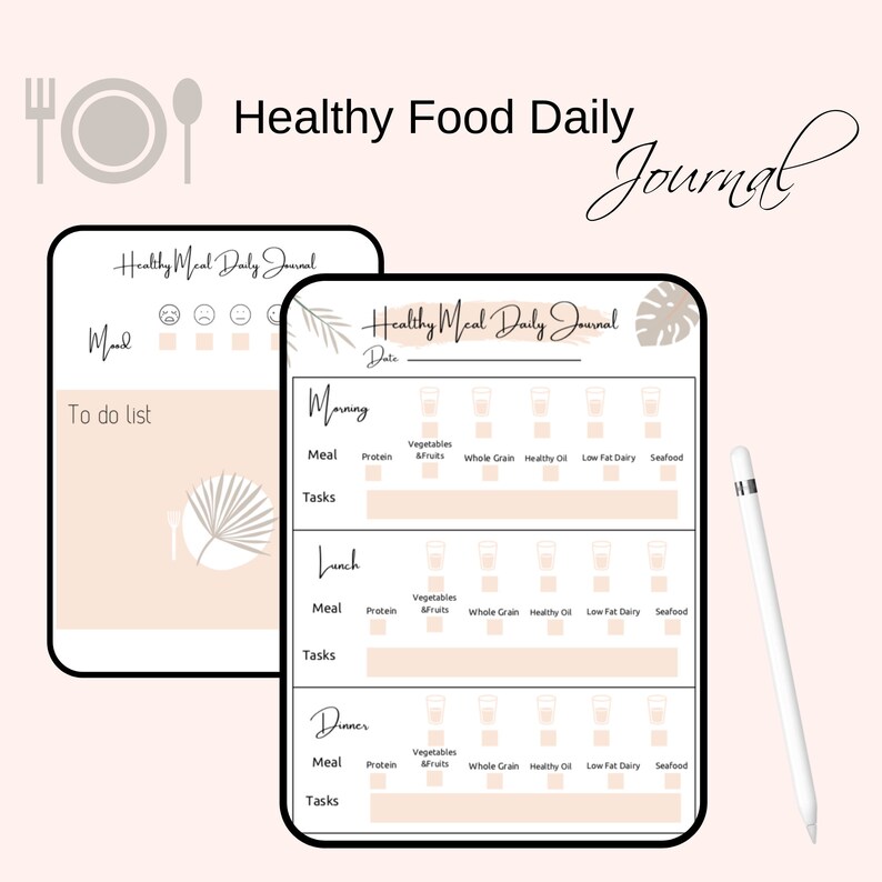 May include: A digital healthy meal daily journal with a light peach background. The journal includes sections for mood, to-do lists, and meal tracking. A white stylus rests beside the journal. The text "Healthy Food Daily Journal" is displayed.