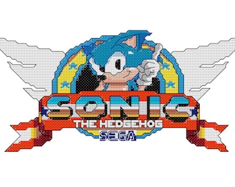 May include: A pixelated image of Sonic the Hedgehog, a blue hedgehog with white gloves, giving a thumbs up. He is in a circle with yellow stars and a red banner that says "SONIC THE HEDGEHOG" and "SEGA".