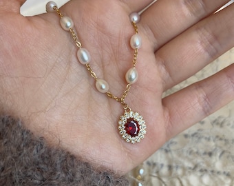 Pearl choker with red pendant