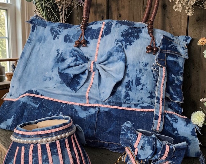 Denim Distressed totebag, sun visor, rimless glasses with matching earrings.