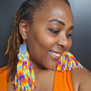 Rainbow Yarn Tassel Earrings with Denim: Bold Statement Jewelry