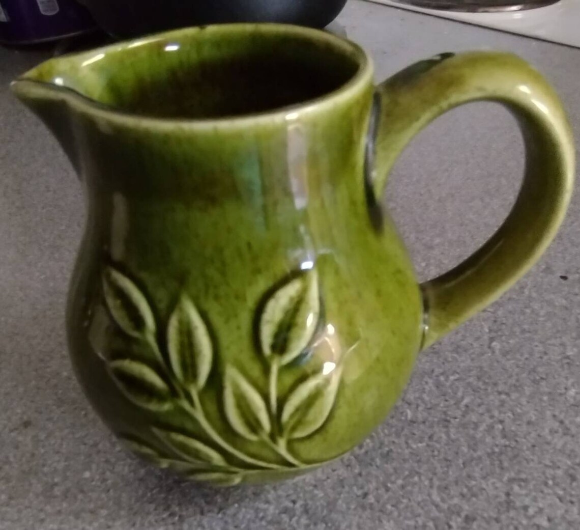 Vintage holkham pottery green jug Etsy