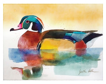 May include: Watercolor painting of a wood duck swimming in a pond. The duck is painted in vibrant colors, including red, blue, green, and yellow. The background is a soft yellow.