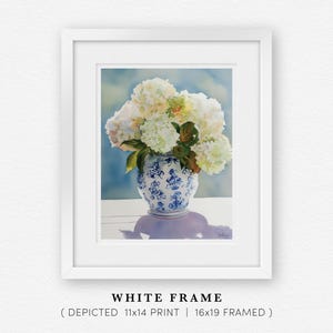 Watercolor print of delicate white hydrangea blossoms in a vintage-style grandmillennial vase, painted with a soft color palette.