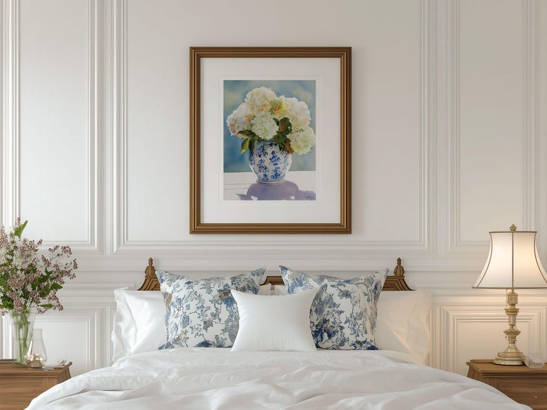 Watercolor print of delicate white hydrangea blossoms in a vintage-style grandmillennial vase, painted with a soft color palette.
