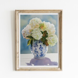 Watercolor print of delicate white hydrangea blossoms in a vintage-style grandmillennial vase, painted with a soft color palette.
